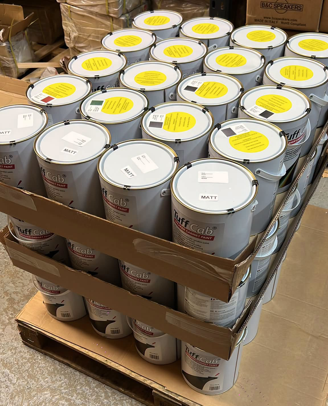 Pallet of TuffCab speaker cabinet paint tins prepared for shipment to Romania